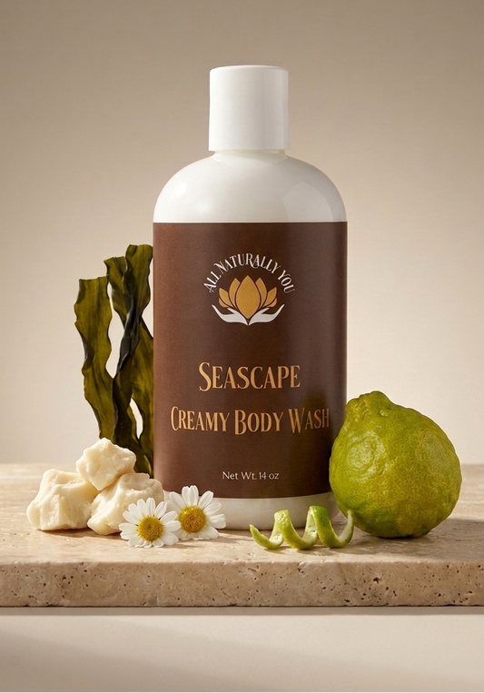 Bottle of Seascape Creamy Body Wash with natural elements on a beige background